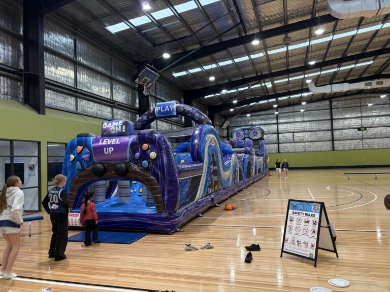 Obstacle course hire Nar Nar Goon indoor inflatable gamer run for school and event hire